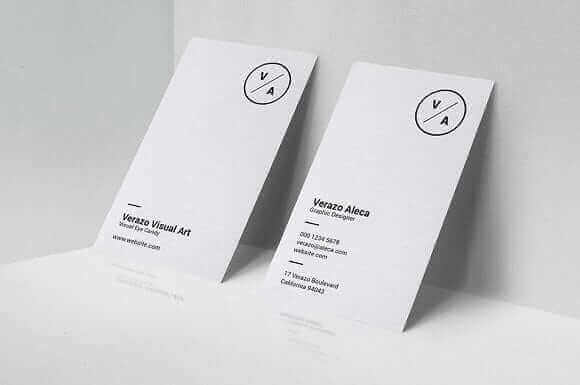 two business cards on a white surface.