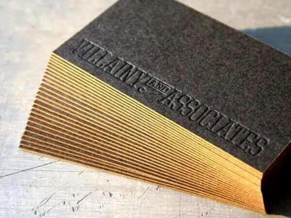 a close up of a business card on a table.