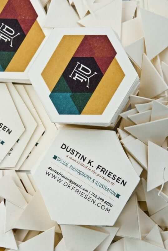 a bunch of business cards sitting on top of each other.