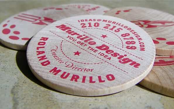 three wooden coasters sitting on top of a table.