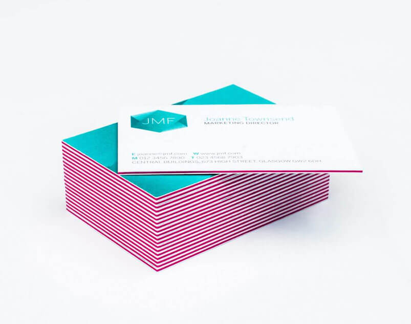 a stack of business cards sitting on top of each other.
