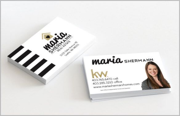 a white business card with a black and white stripe.